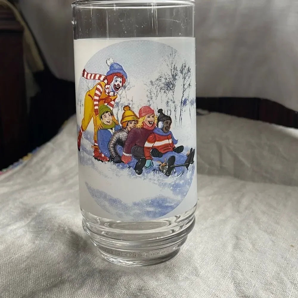 Vintage Ronald McDonald winter sled scene glass.